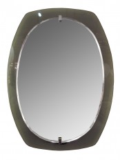 Elliptical mirror with smoked glass surround